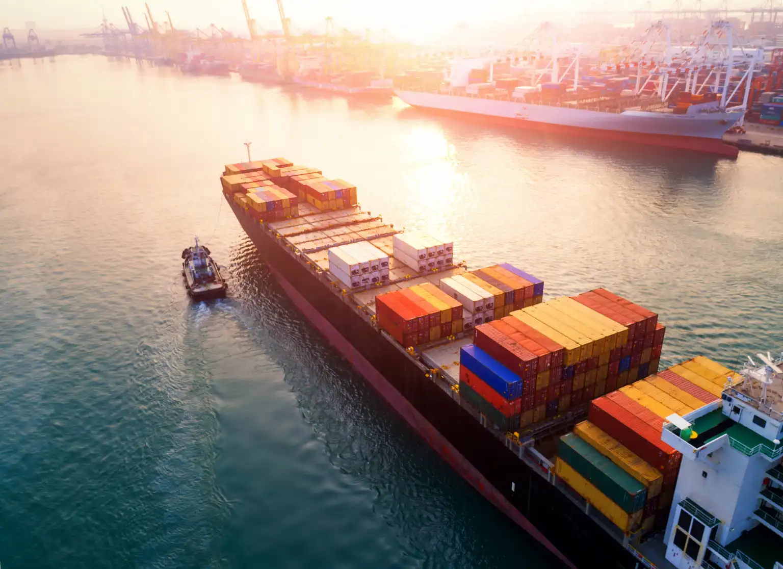 Aerial view of cargo ship with colorful shipping containers